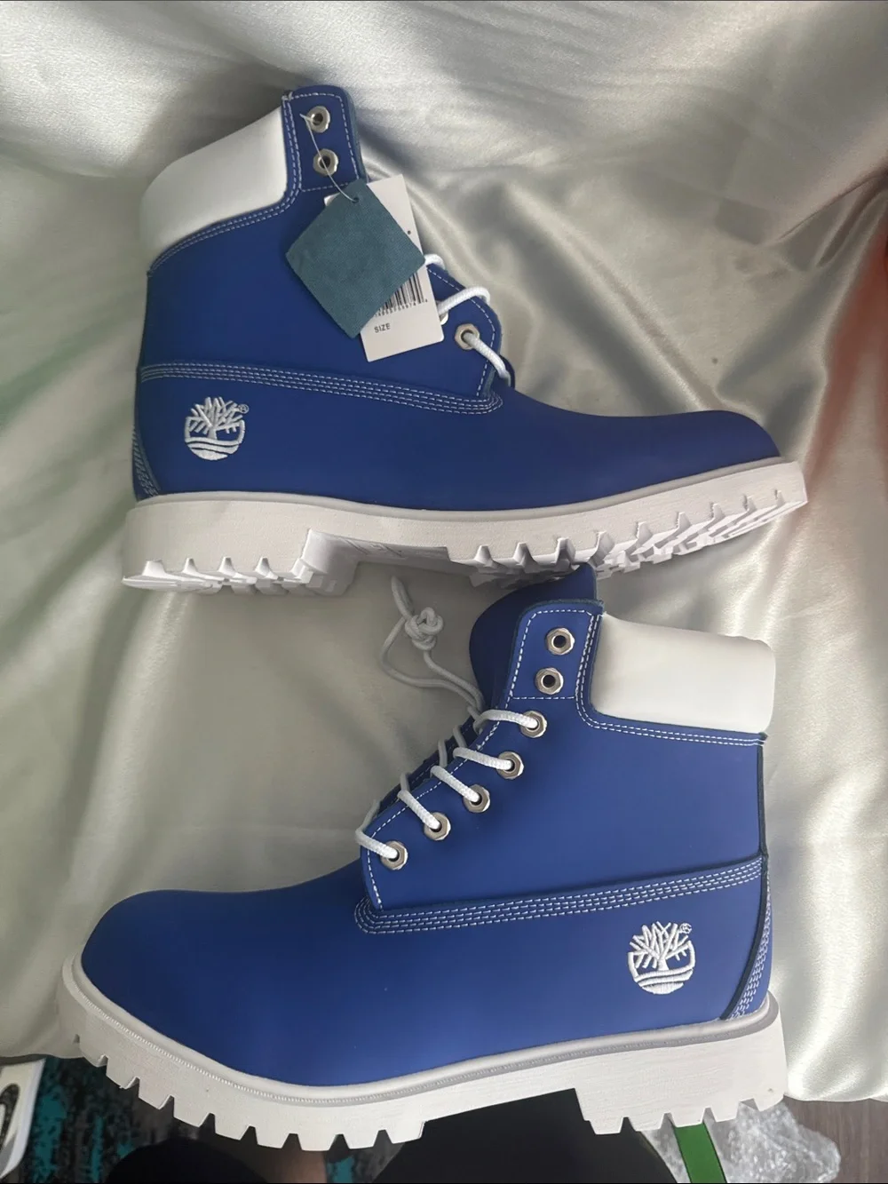 New! Timberland Premium 6-Inch boots featuring a vibrant blue nubuck upper.